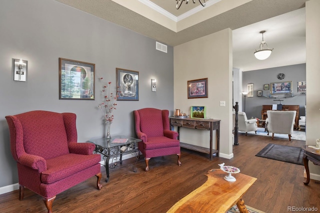 3973 Palmer Ridge Dr, Parker, CO 80134 - living area featuring wood finished floors and crown molding