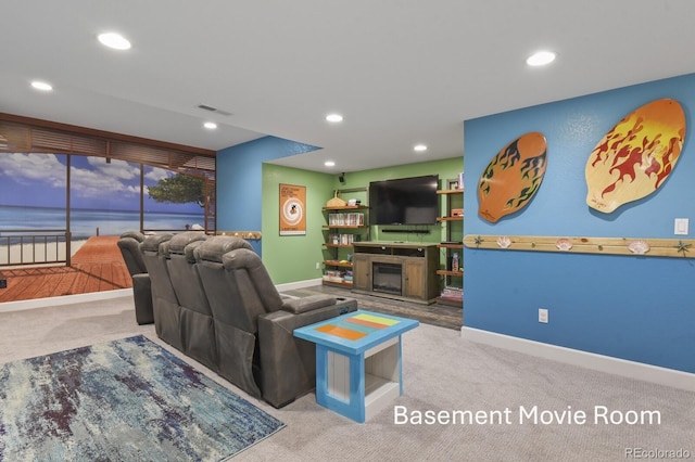3973 Palmer Ridge Dr, Parker, CO 80134 - carpeted living room with recessed lighting and a fireplace