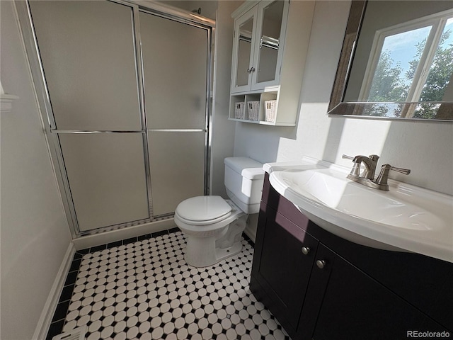 5163 E 123rd Ct, Thornton, CO 80241 - bathroom with vanity, a stall shower, and tile patterned floors