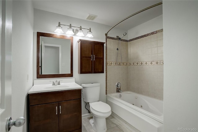 5163 E 123rd Ct, Thornton, CO 80241 - full bathroom featuring a combined bath / shower with jetted tub, vanity, and tile patterned flooring