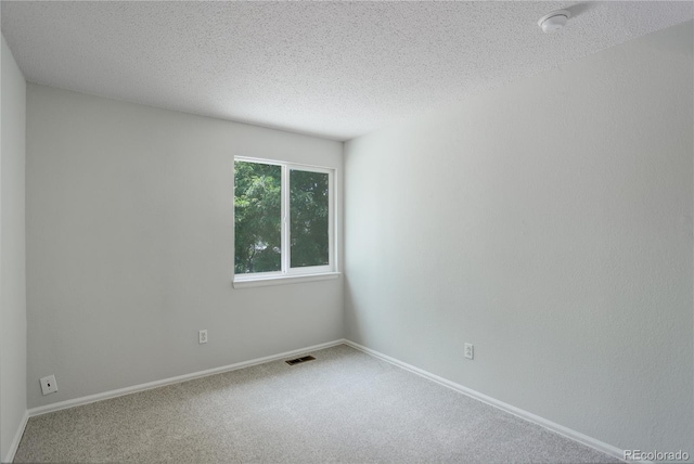 5163 E 123rd Ct, Thornton, CO 80241 - carpeted spare room featuring a textured ceiling and a smoke detector