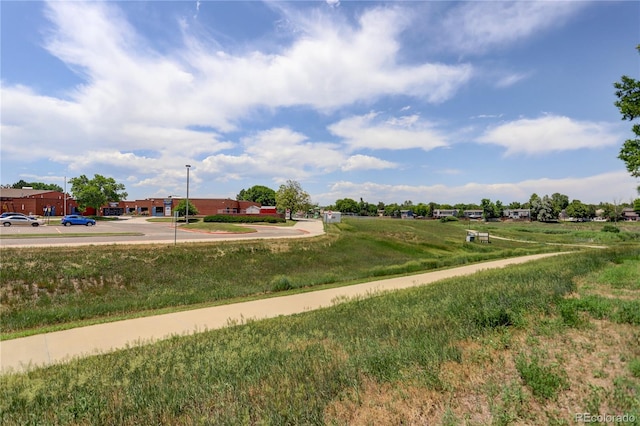 5163 E 123rd Ct, Thornton, CO 80241 - view of home's community featuring a lawn