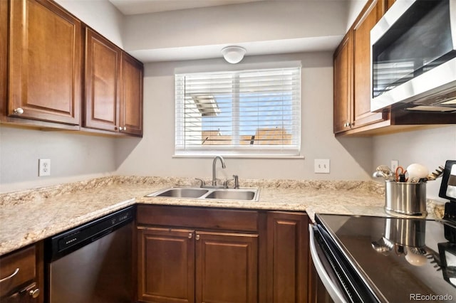 kitchen featuring stainless steel appliances and sink