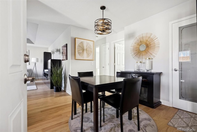 dining area featuring wood-type flooring