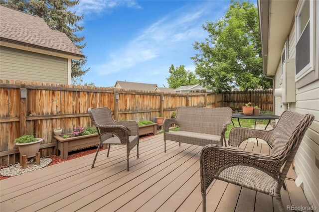 17499 E Whitaker Dr, Aurora, CO 80015 - deck with a fenced backyard