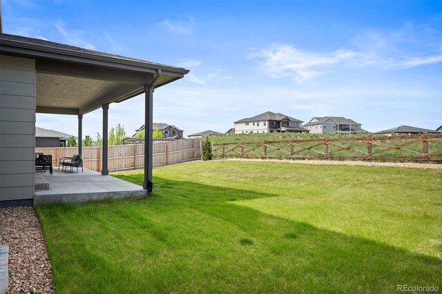 14391 Shasta Daisy Pt, Parker, CO 80134 - view of yard featuring a patio area