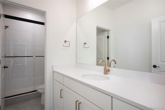14391 Shasta Daisy Pt, Parker, CO 80134 - full bathroom with toilet, vanity, a stall shower, and tile patterned flooring