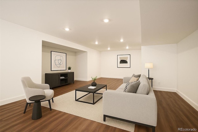 14391 Shasta Daisy Pt, Parker, CO 80134 - living room featuring baseboards, dark wood-style flooring, and recessed lighting