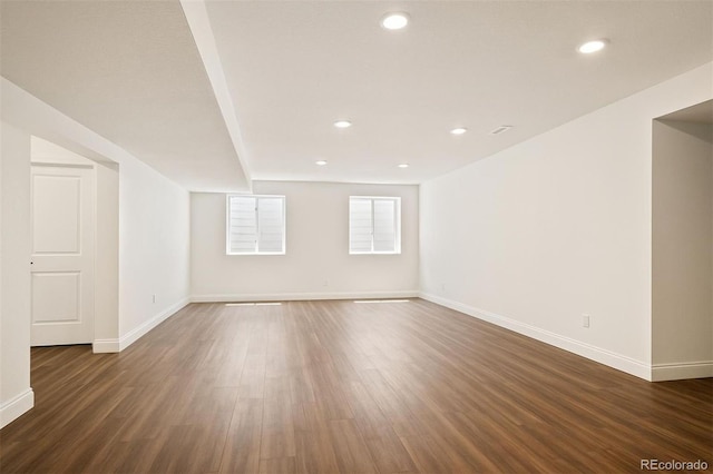 14391 Shasta Daisy Pt, Parker, CO 80134 - spare room featuring baseboards, dark wood-type flooring, and recessed lighting