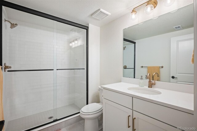 14391 Shasta Daisy Pt, Parker, CO 80134 - full bath featuring toilet, a shower stall, vanity, and tile patterned floors