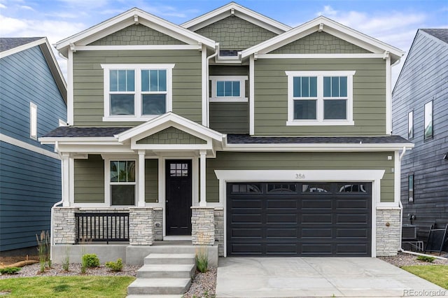 craftsman-style house featuring a garage