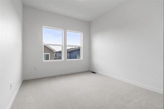 empty room with carpet floors