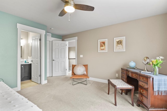 8741 E 29th Ave, Denver, CO 80238 - bedroom with a ceiling fan, visible vents, baseboards, ensuite bath, and light carpet