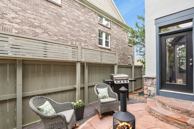 8741 E 29th Ave, Denver, CO 80238 - view of patio with fence and grilling area