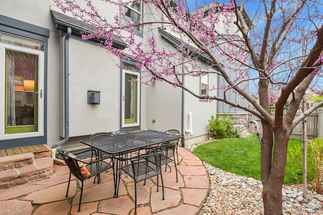 8741 E 29th Ave, Denver, CO 80238 - view of patio / terrace with outdoor dining area and fence