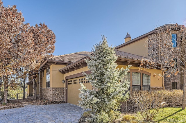 view of front of property featuring a garage