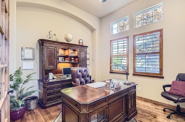 office space with light hardwood / wood-style floors