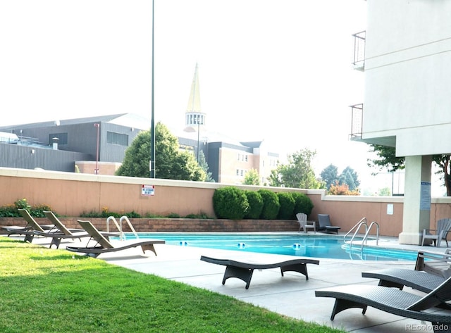 community pool featuring a patio