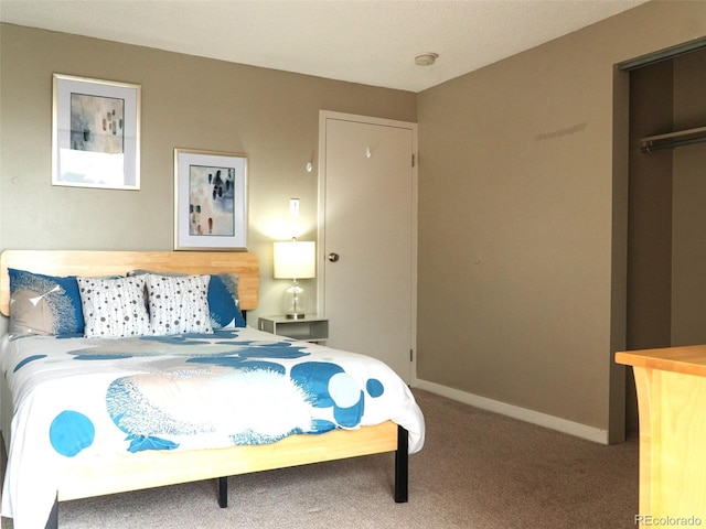 2225 Buchtel Blvd Unit 202, Denver, CO 80210 - bedroom with baseboards and carpet floors