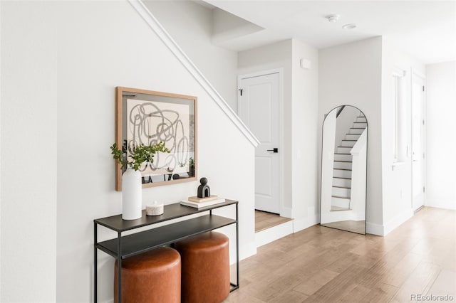 3955 W 13th Ave, Denver, CO 80204 - hall featuring stairs and light wood finished floors