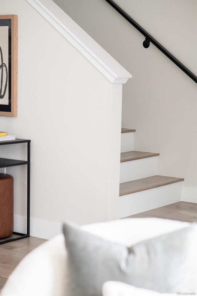 3955 W 13th Ave, Denver, CO 80204 - stairway featuring wood finished floors