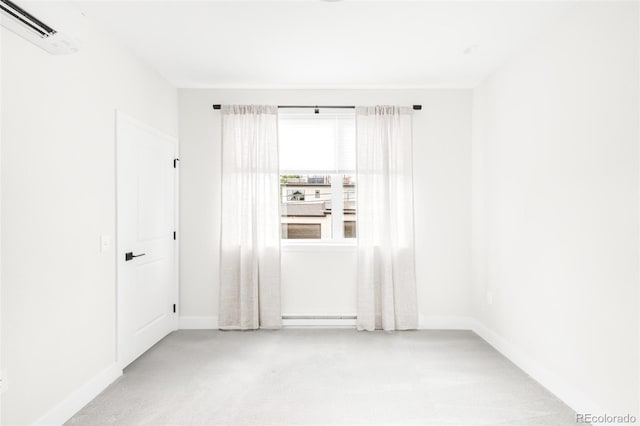 3955 W 13th Ave, Denver, CO 80204 - unfurnished room featuring a wall unit AC and carpet flooring