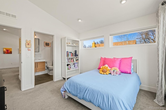 carpeted bedroom featuring visible vents, ensuite bath, recessed lighting, baseboards, and vaulted ceiling