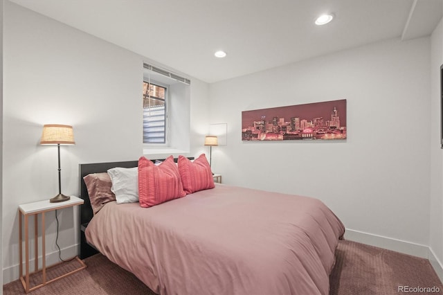 carpeted bedroom featuring recessed lighting and baseboards