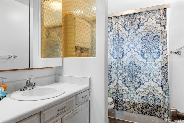 1261 Eagle St, Aurora, CO 80011 - full bathroom featuring vanity and toilet