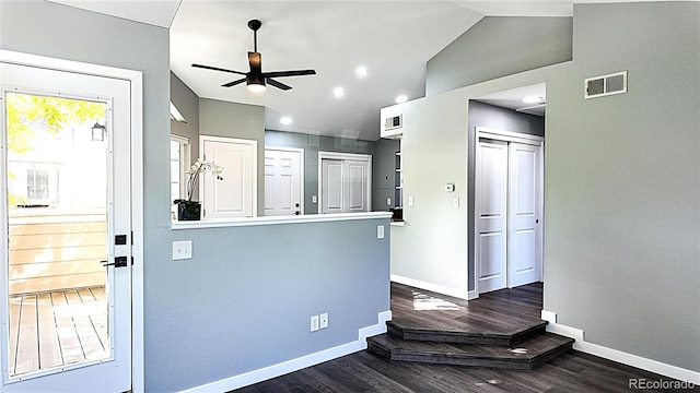 kitchen featuring lofted ceiling, ceiling fan, and dark hardwood / wood-style floors