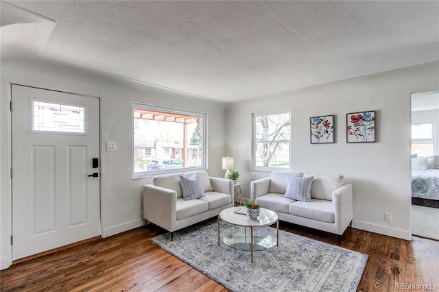 6220 W 11th Pl, Lakewood, CO 80214 - living room with healthy amount of natural light and wood finished floors
