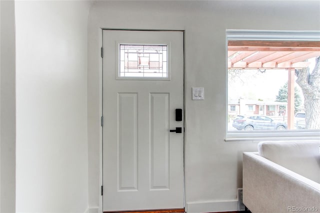 6220 W 11th Pl, Lakewood, CO 80214 - foyer featuring baseboards