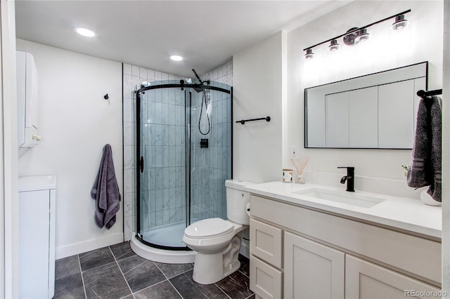 6220 W 11th Pl, Lakewood, CO 80214 - bathroom featuring vanity, a stall shower, and recessed lighting