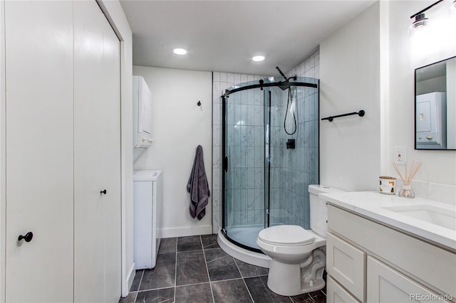6220 W 11th Pl, Lakewood, CO 80214 - full bath featuring vanity, a shower stall, washer / clothes dryer, and recessed lighting