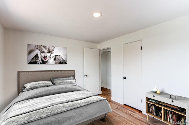 6220 W 11th Pl, Lakewood, CO 80214 - bedroom with wood finished floors and recessed lighting