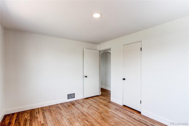 6220 W 11th Pl, Lakewood, CO 80214 - unfurnished bedroom with light wood-type flooring, recessed lighting, and a closet