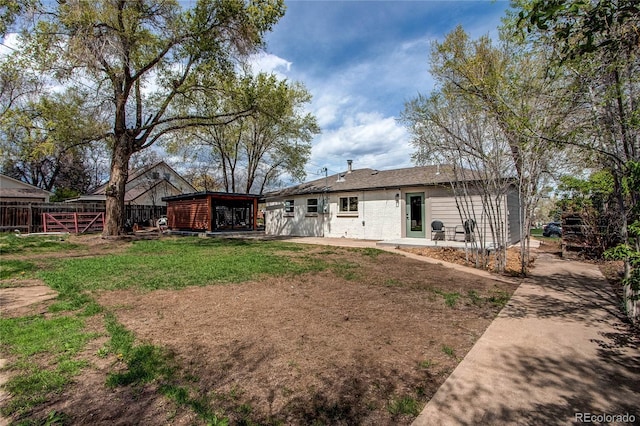 6220 W 11th Pl, Lakewood, CO 80214 - back of property featuring a patio