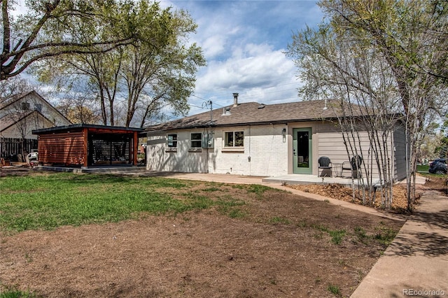 6220 W 11th Pl, Lakewood, CO 80214 - rear view of house featuring a lawn