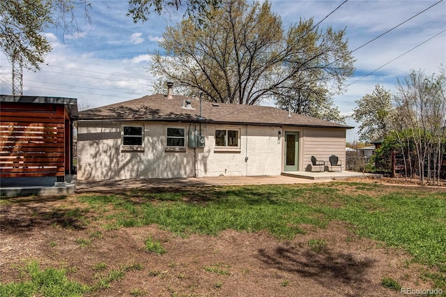 6220 W 11th Pl, Lakewood, CO 80214 - rear view of house with a patio area and a lawn