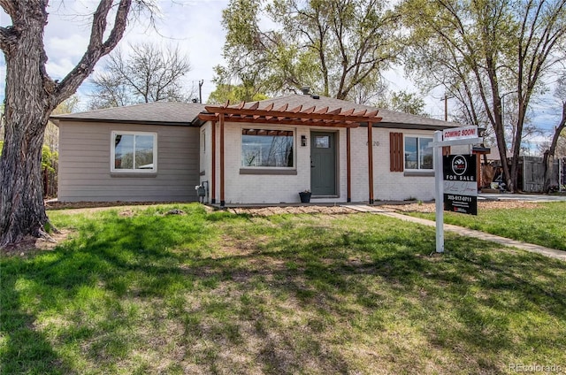 6220 W 11th Pl, Lakewood, CO 80214 - ranch-style house featuring a pergola and brick siding