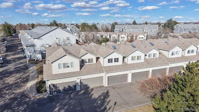 drone / aerial view with a residential view