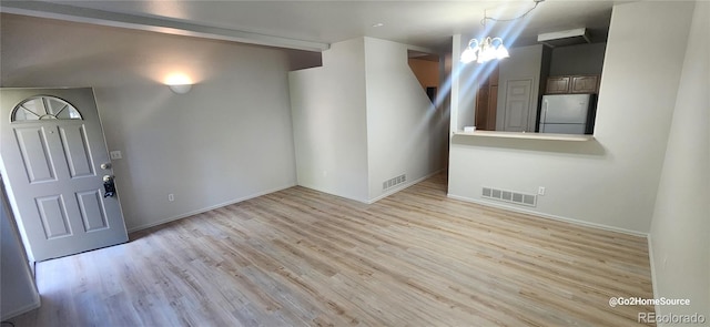12327 E Tennessee Dr Unit 107, Aurora, CO 80012 - foyer featuring wood finished floors and baseboards
