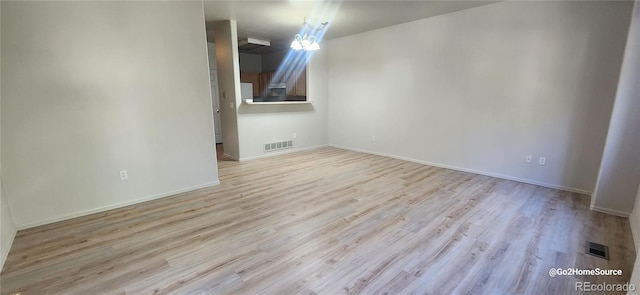 12327 E Tennessee Dr Unit 107, Aurora, CO 80012 - unfurnished room with wood finished floors and baseboards