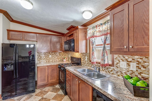 1214 Mac Kay Ct, Dacono, CO 80514 - kitchen featuring black appliances, crown molding, lofted ceiling, a textured ceiling, and decorative backsplash