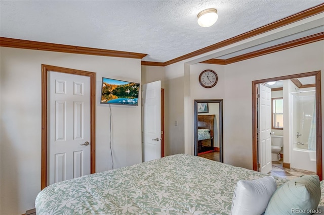 1214 Mac Kay Ct, Dacono, CO 80514 - bedroom with crown molding, a textured ceiling, and ensuite bath