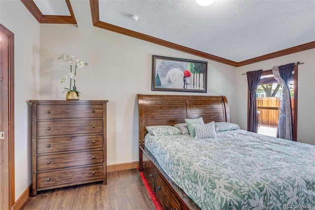 1214 Mac Kay Ct, Dacono, CO 80514 - bedroom featuring wood finished floors, ornamental molding, and a textured ceiling