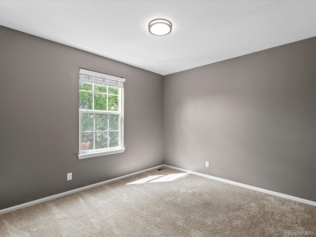 11082 Fillmore Way, Northglenn, CO 80233 - carpeted spare room featuring baseboards