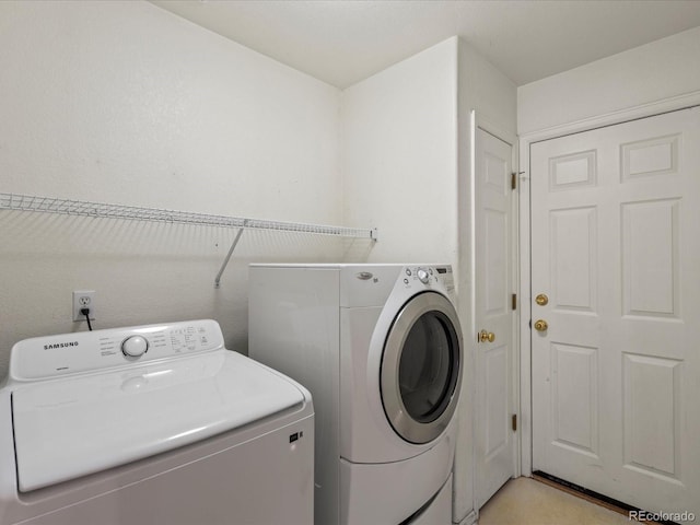 11082 Fillmore Way, Northglenn, CO 80233 - laundry room featuring washer and clothes dryer