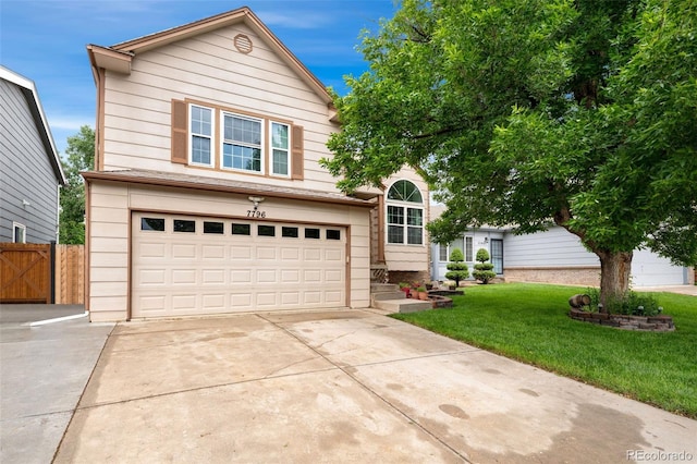 7796 Xavier Ct, Westminster, CO 80030 - traditional-style home featuring concrete driveway and an attached garage