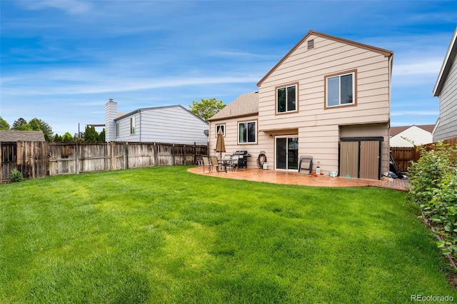 7796 Xavier Ct, Westminster, CO 80030 - back of property featuring a patio area